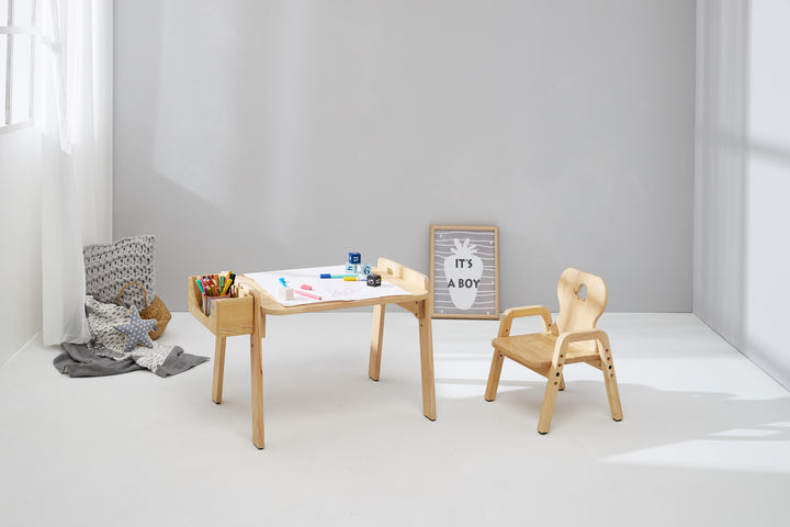 a wooden table and two chairs in a room