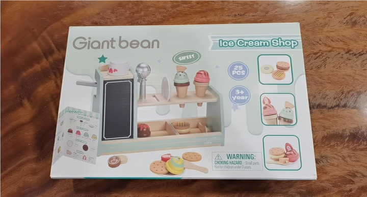 an ice cream shop in a box on a table