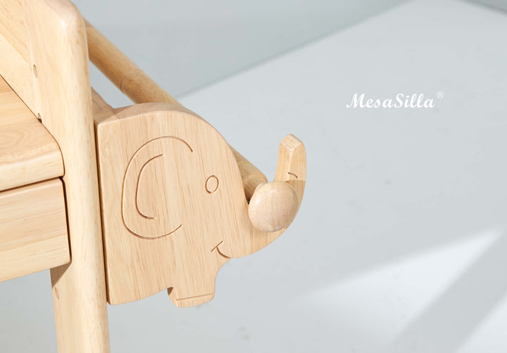 a close up of a wooden toy elephant