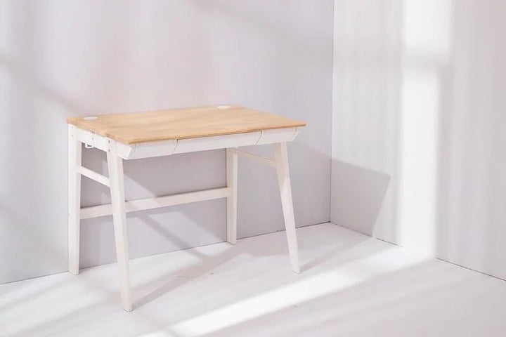 a white desk with a wooden top in a room