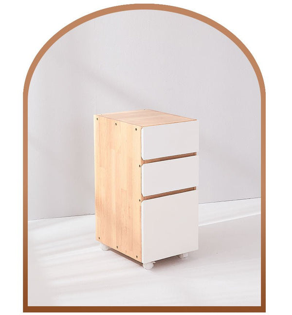 a white cabinet with two drawers on top of it