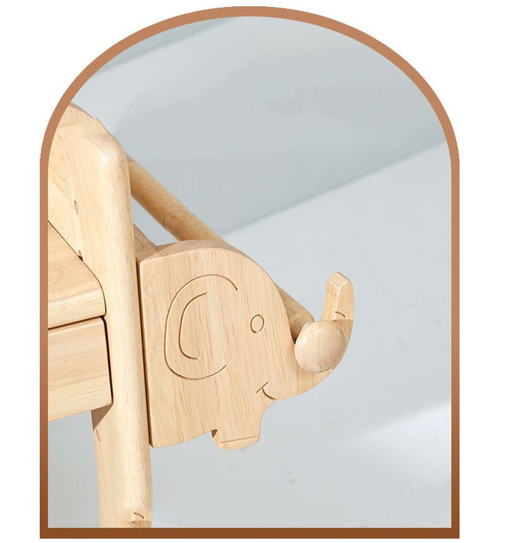 a close up of a wooden toy elephant