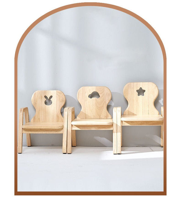 a group of wooden chairs sitting next to each other