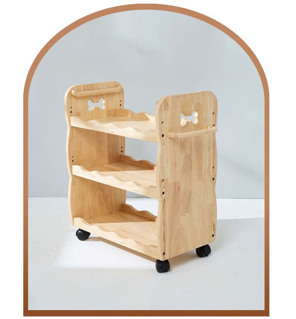 a small wooden shelf with wheels on a white surface