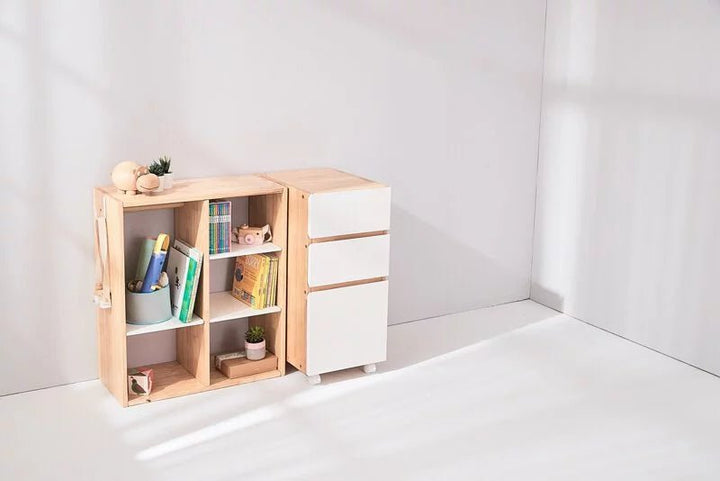 a book shelf with books on top of it