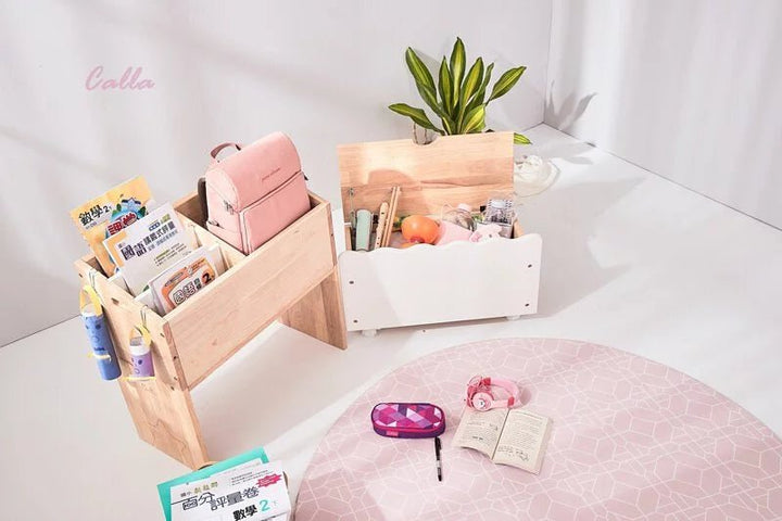 a table with a pink table cloth and a pink chair