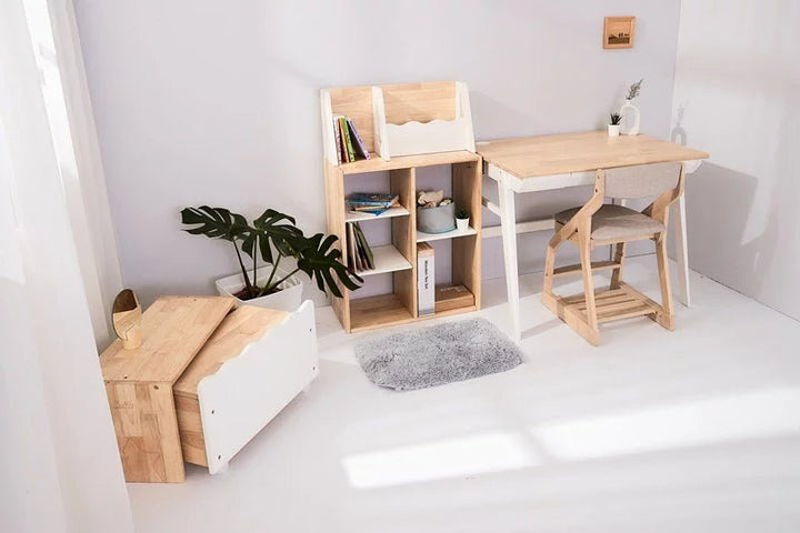 a room with a desk, chair, and bookshelf