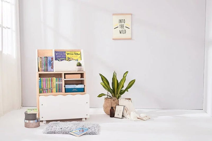 a room with a book shelf and a potted plant