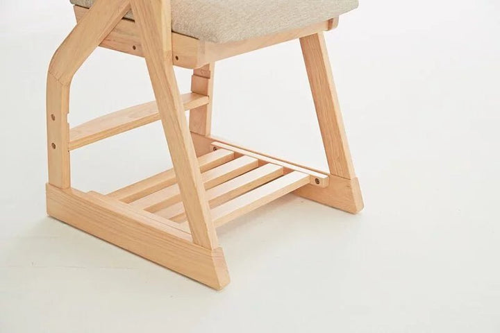 a wooden chair with a seat made of wood