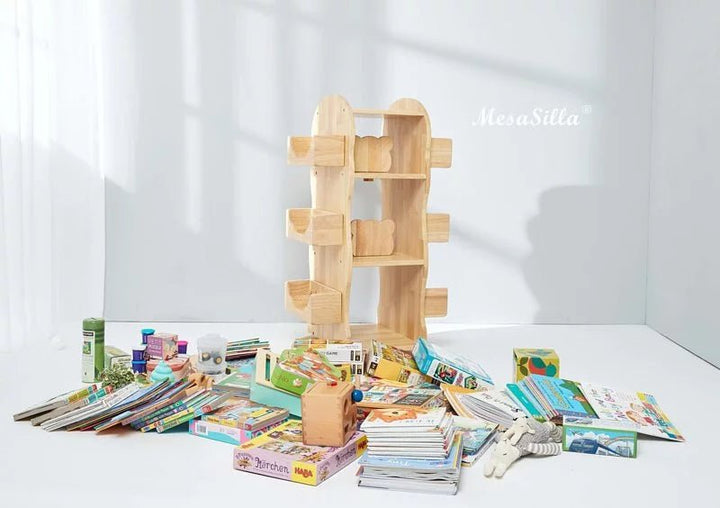 a pile of books sitting on top of a white table